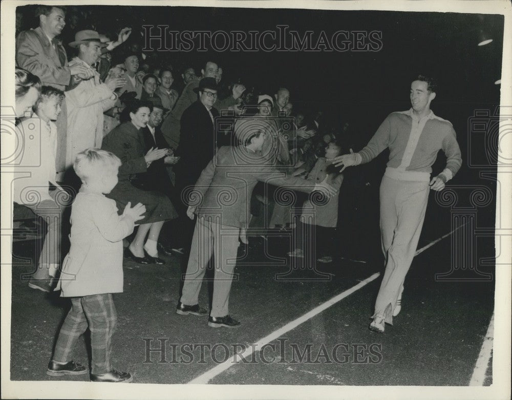 1956 Gordon Pirie and fans after he madce record  in 3000 M - Historic Images