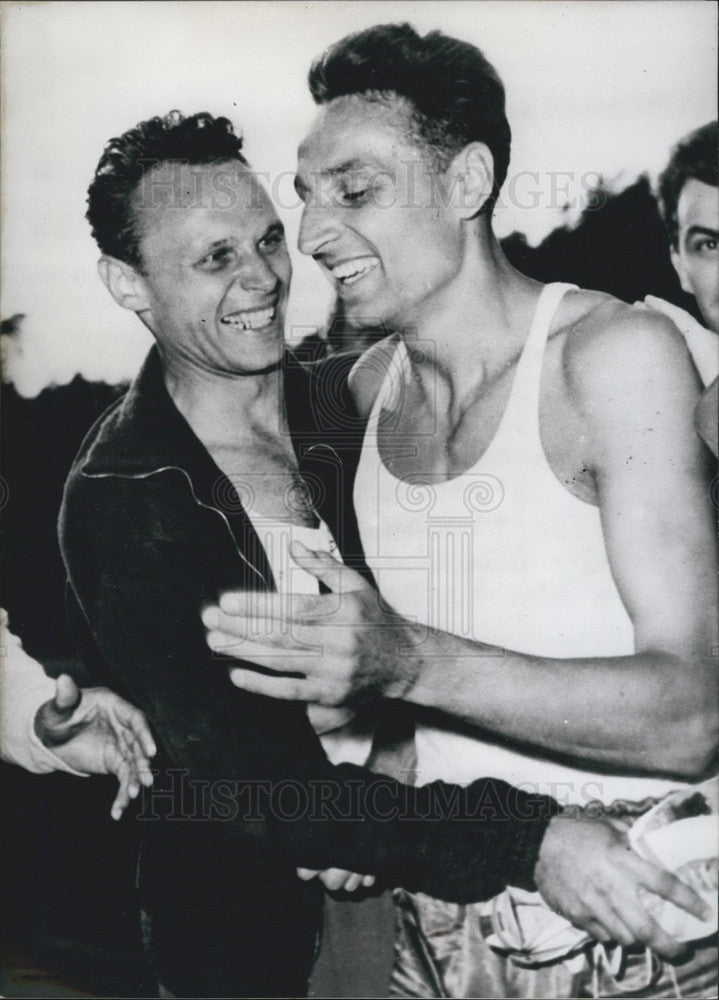 1960  Russian Fiedosiejew in the hop-skip jump & brother Edward - Historic Images