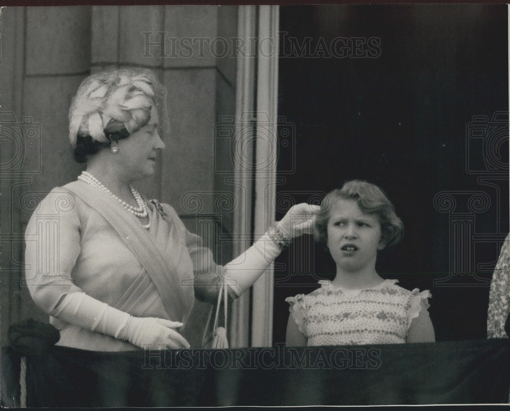 1959, Queen Mother adjusts Princess Anne's Hair at Buckingham Palace - Historic Images