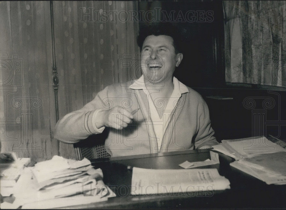 Press Photo Pierre Poujad, Political Leader of Trades in Fance Smiles At Desk-Historic Images