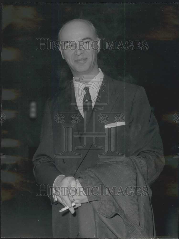 1965, Gaston Naessens smokes before his Criminal Trial - KSB07363 - Historic Images