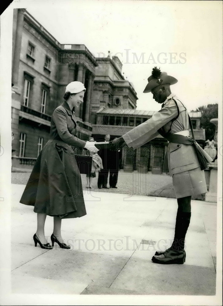 1957, The Queen accepts a book on the History of the Regiment - Historic Images