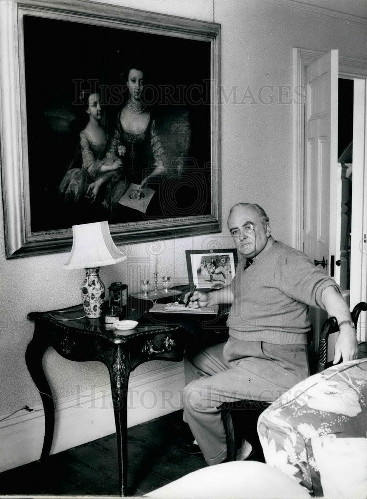 Press Photo Master of Falkland writes the menus for the day's meals - KSB14847 - Historic Images