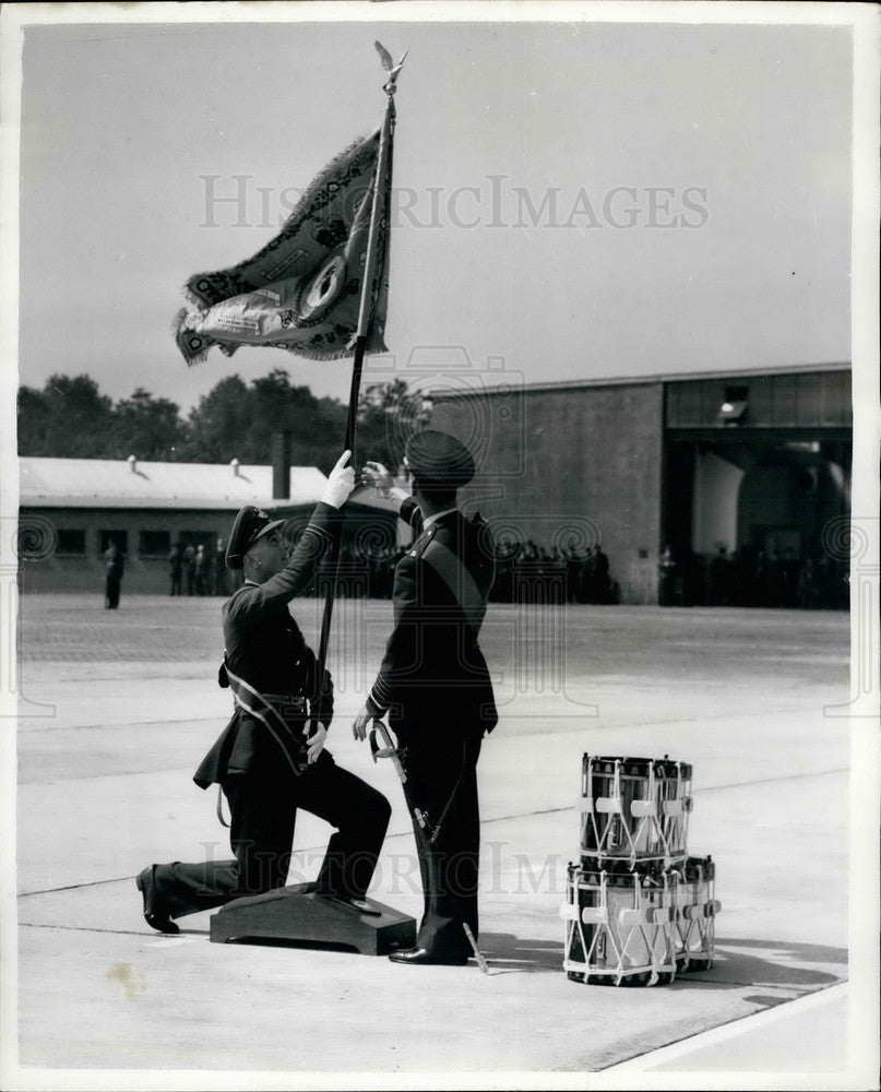 1955 Duke Of Edinburgh presents a standard flag  - Historic Images