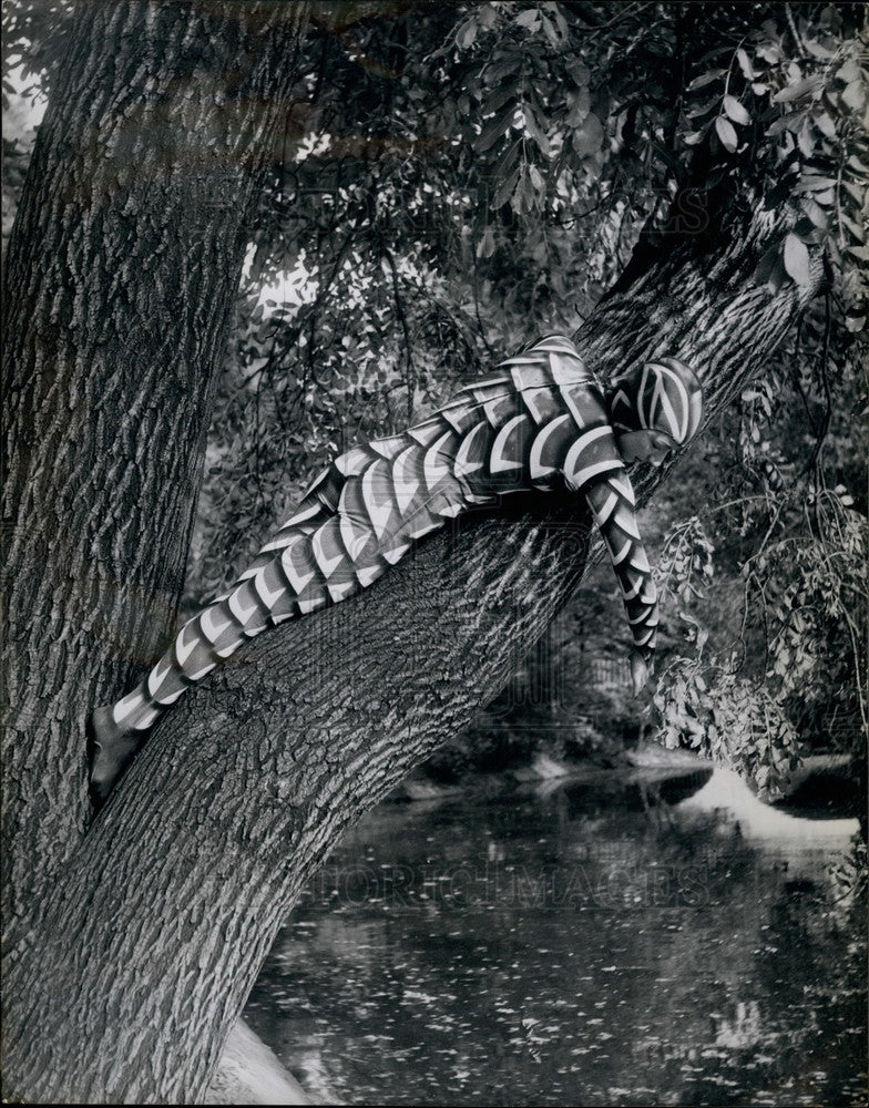 Press Photo Rose Llanos in costume for act ,takes break in a tree - KSB16527 - Historic Images