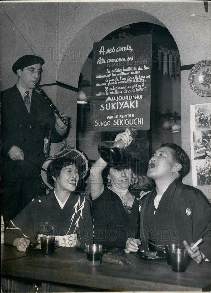 1954, Japanese Artist ,Sukiguish and friends in a restaurant - Historic Images