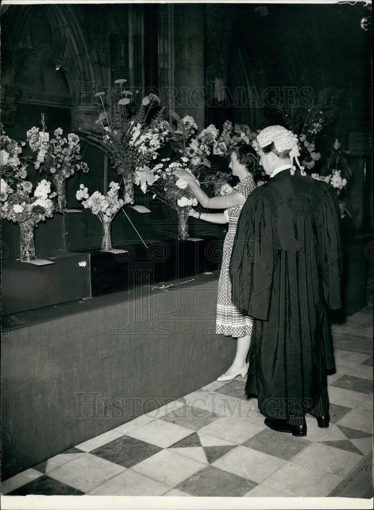 1958, A Barrister and lady arranging flowers at a Show - KSB16953 - Historic Images