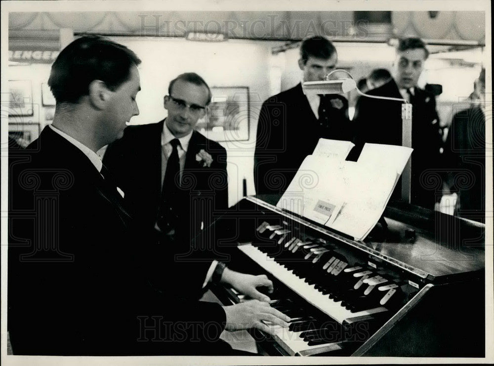 Doctors playina a piano  - Historic Images