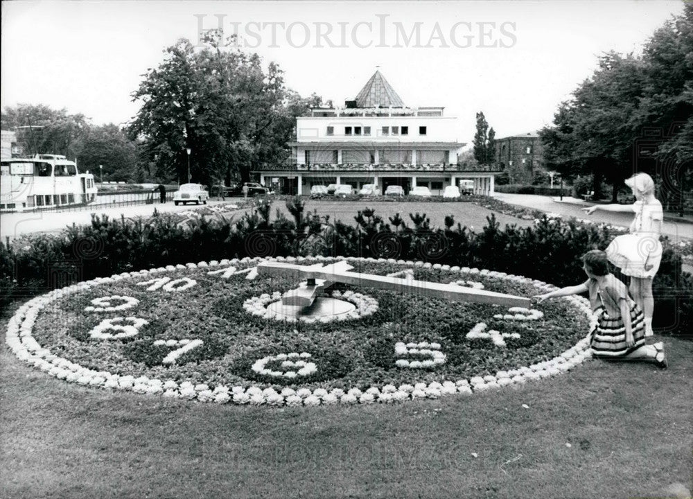 1965 An Old-Style Sundial Decorated With Flowers But Modernized - Historic Images