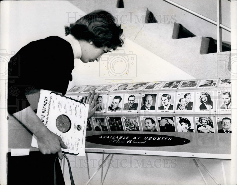 Press Photo Revolving recor selector in a shop - KSB19839-Historic Images