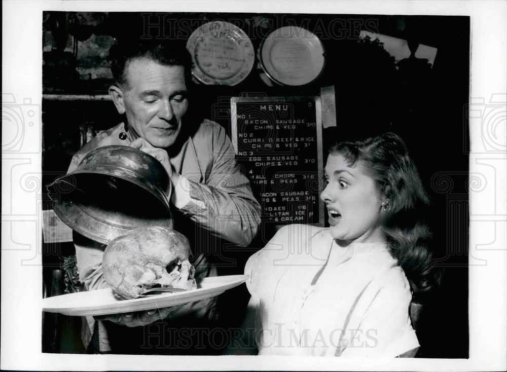 Press Photo Man and girl with cooked bird - KSB24895-Historic Images