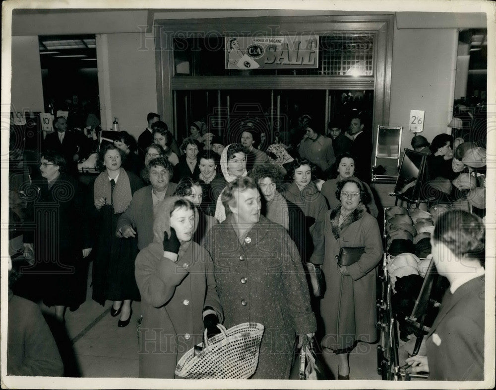 1957 Crowds for opening of sale at store - Historic Images