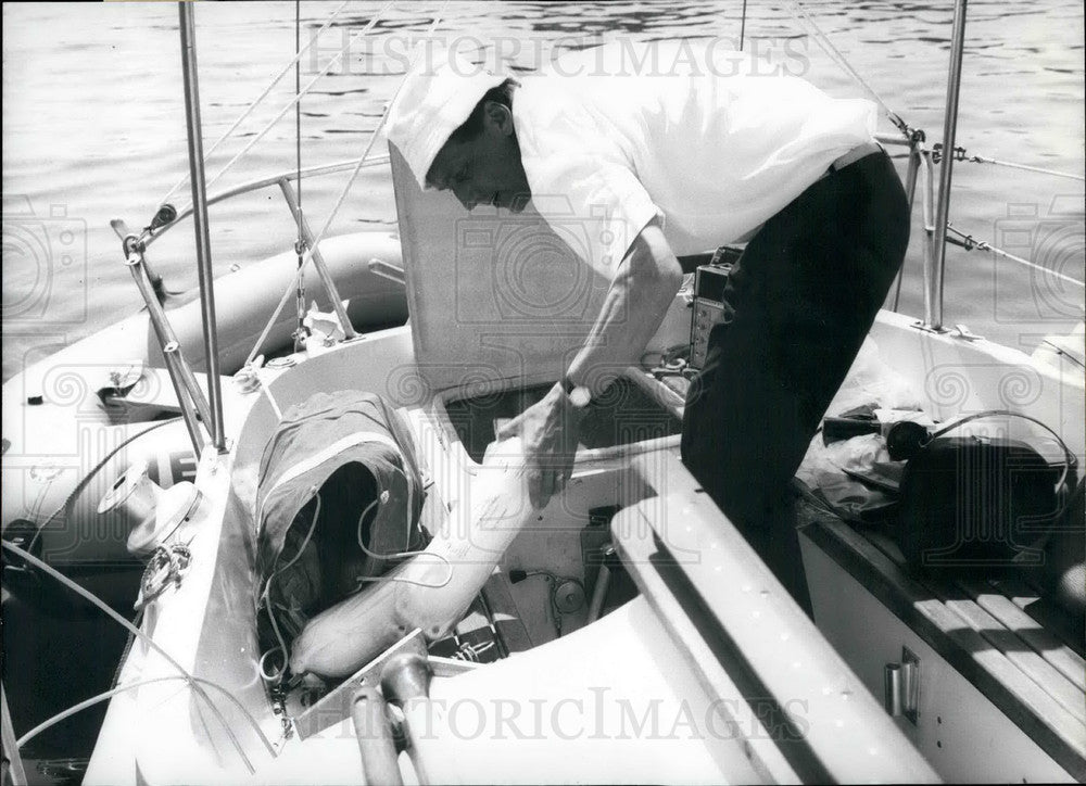1967 Rollo Gebhard loading this boat  - Historic Images