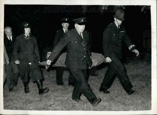 1957 Mrs. Maitland's Body Carried Away From Cranford Park - Historic Images