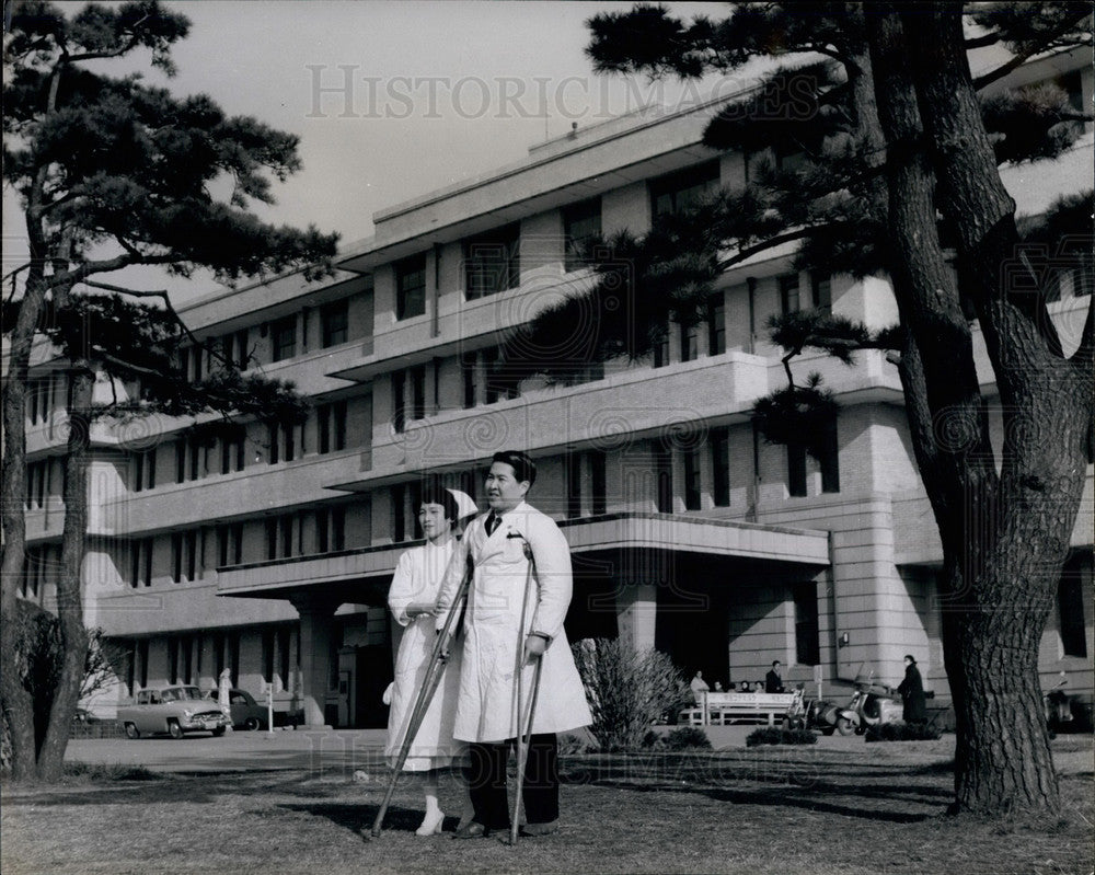 Press Photo Dr. Watanabe, &quot;Doctor Courageous&quot;, Walks In The Hospital Gardens-Historic Images