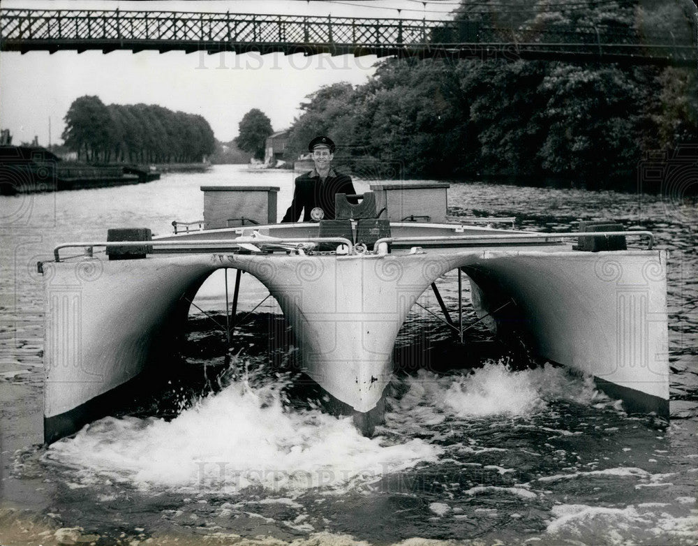 1965 John Burgess testing the 3 hulled boat on the Thames - Historic Images