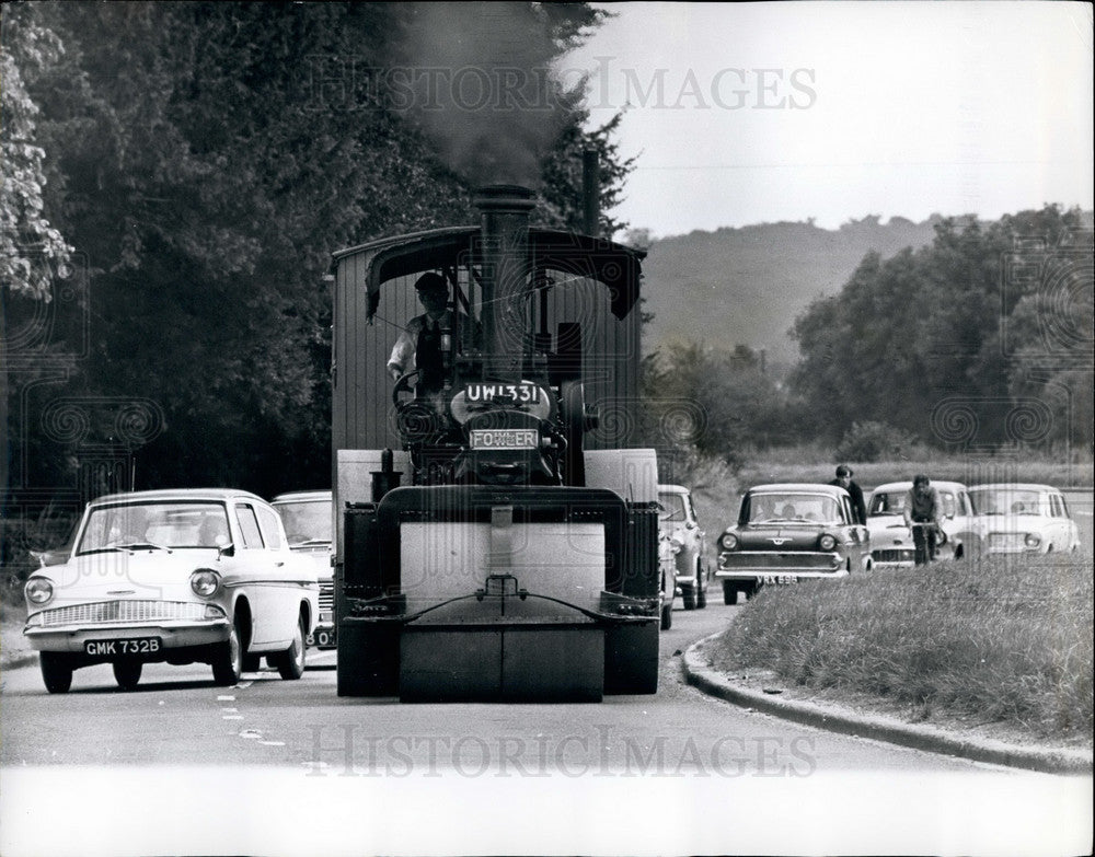 1965 Harold Bonnet Drives His Steamroller Thru Crowded Roads - Historic Images