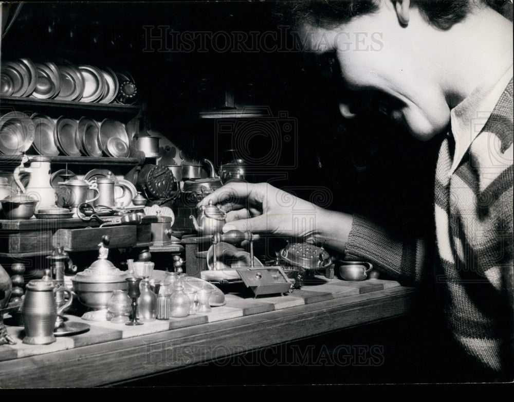 1953 Small kitchen full of utensils made of copper and tin - Historic Images
