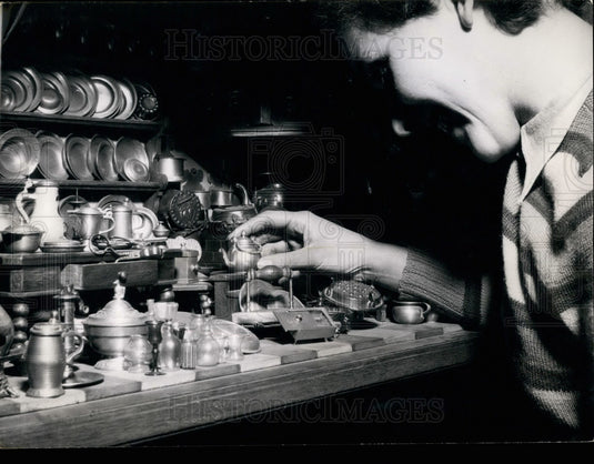 1953 Small kitchen full of utensils made of copper and tin - Historic Images