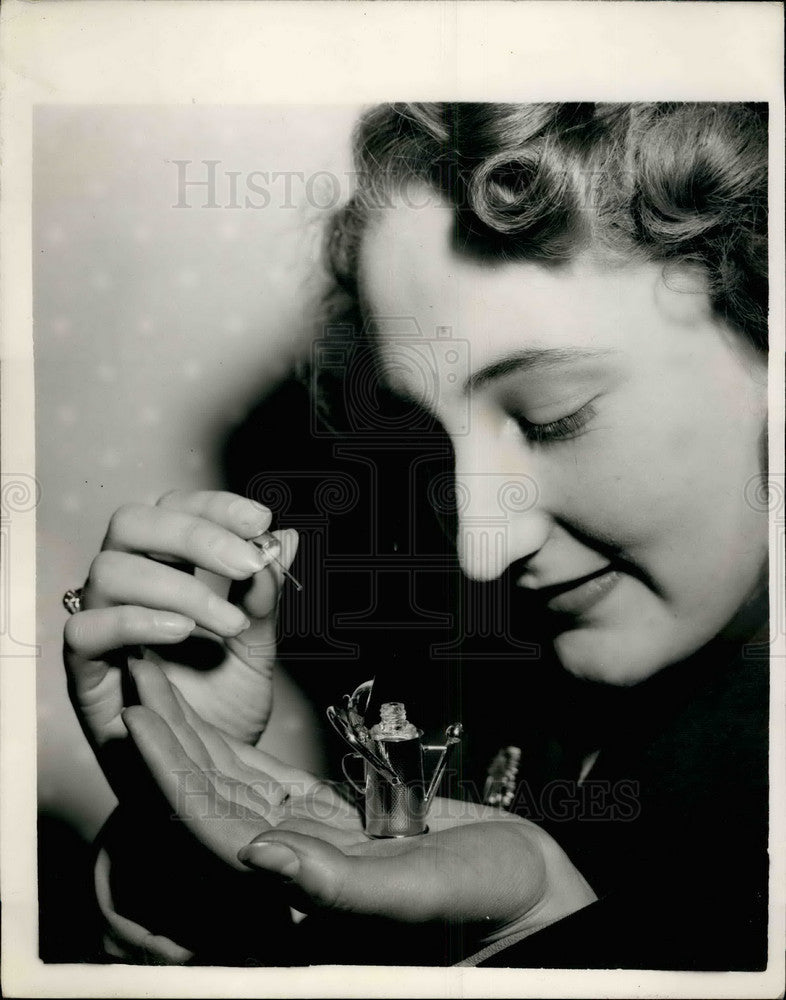 1953 Press Photo Miss Jean Boult and a perfume container - KSB32731-Historic Images