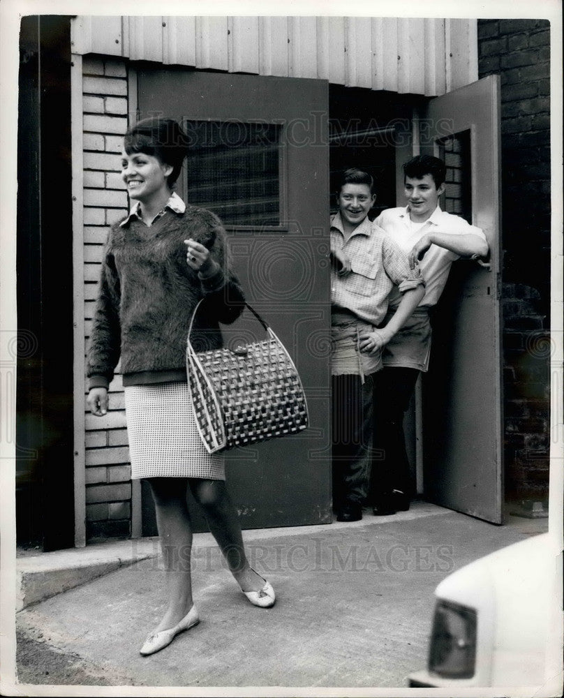 1962 Barbara Smith is back to wearing a skirt for work - Historic Images