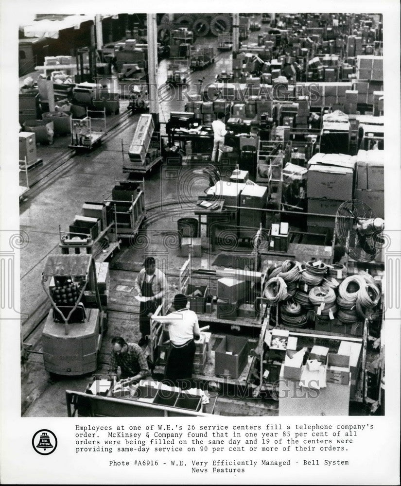 Press Photo McKinsey &amp; Company warehouse fill phone orders - Historic Images