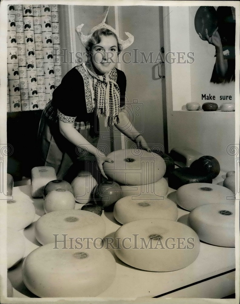 1953, Ann Tigwell and assortment of Dutch Cheeses - KSB35561 - Historic Images