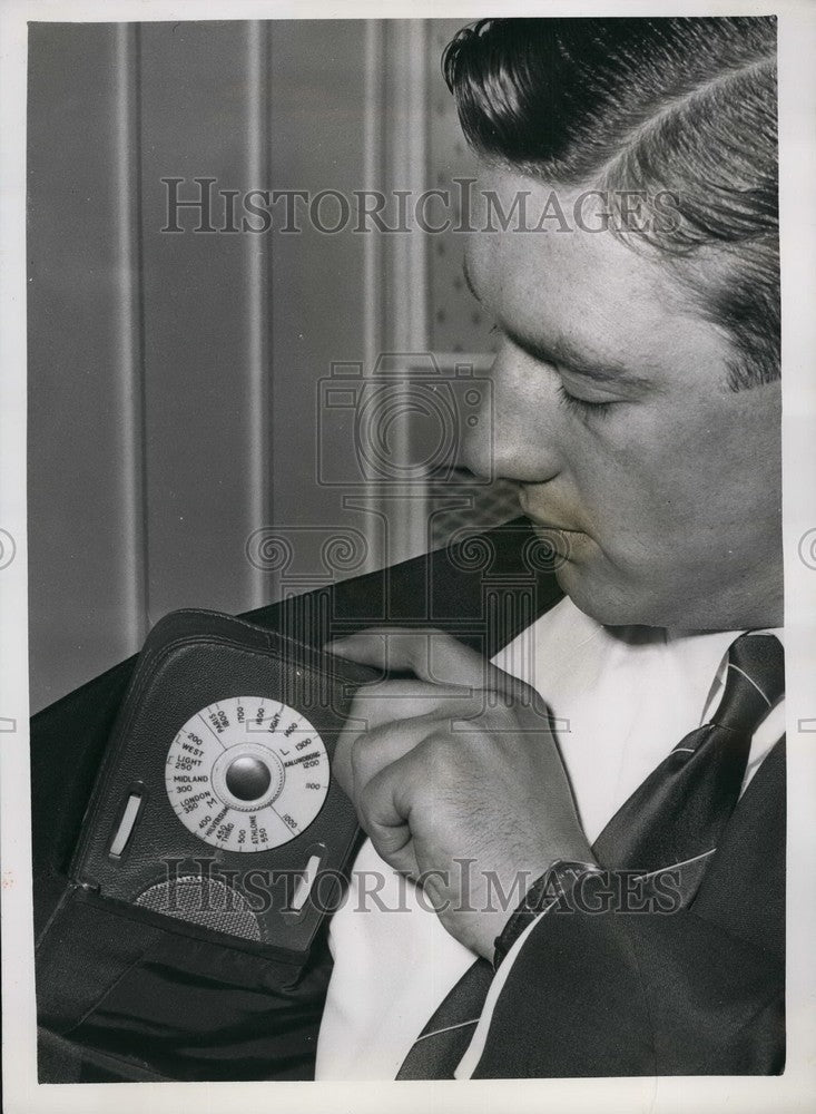 1957  Mr. Richard Roberts with Pocket Radio - Historic Images