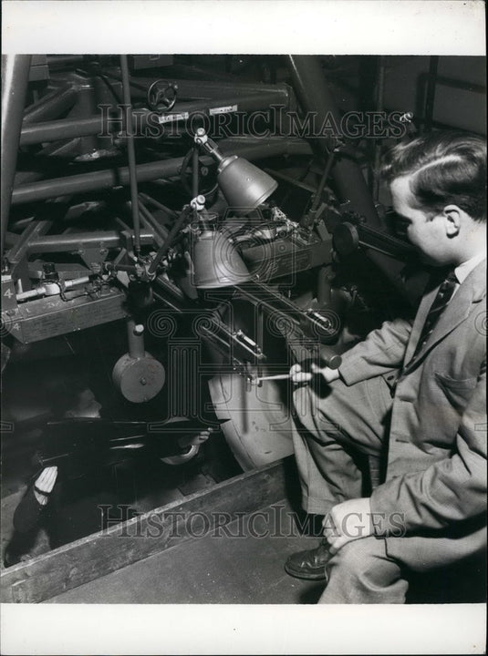 Press Photo Student Working onModel of a Supersonic Passenger Transport Plane - Historic Images