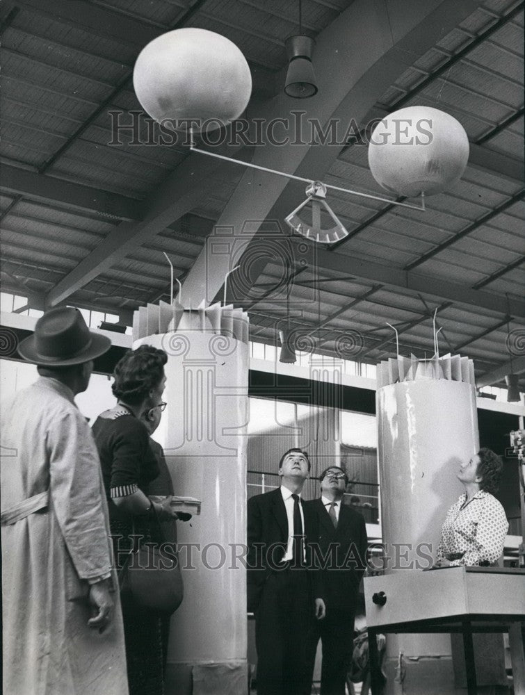 1957 Technician Displays Twin Balls Held Aloft Pointer - Historic Images