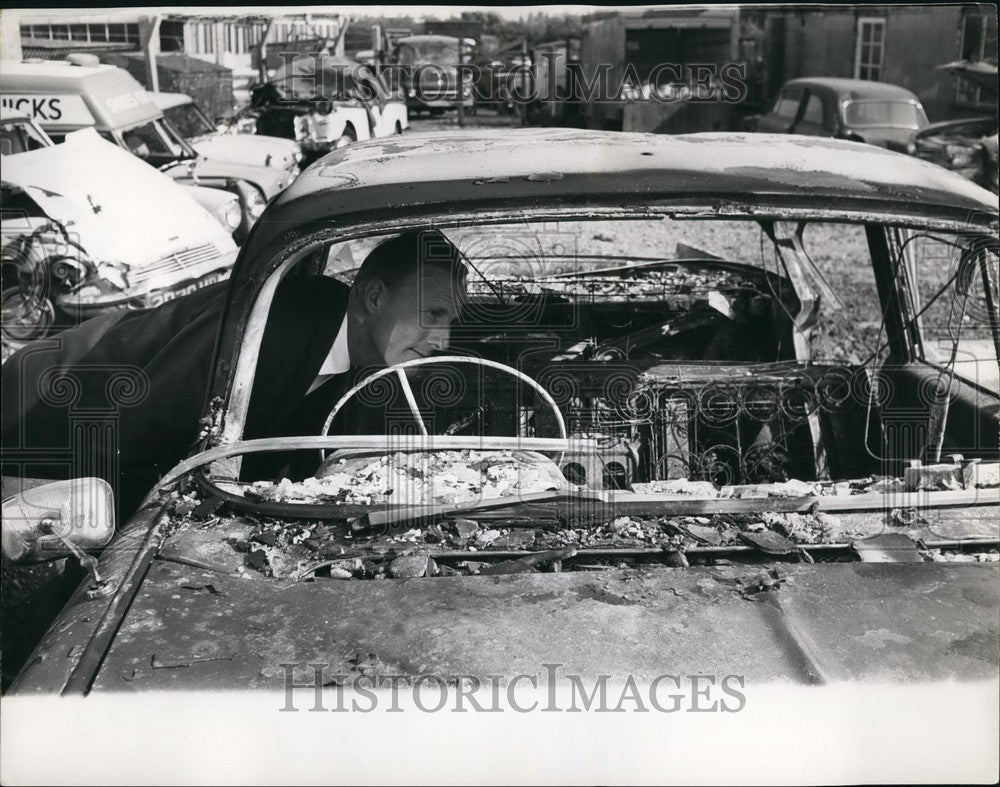 1964  Peter Fordham accident gas blow up underneath Taxi - Historic Images