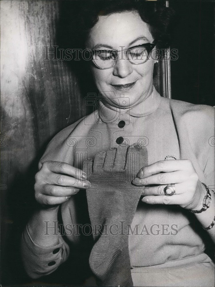 1954, Woman Holding Toes Stocking Wiesbaden Store Sport Articles - Historic Images