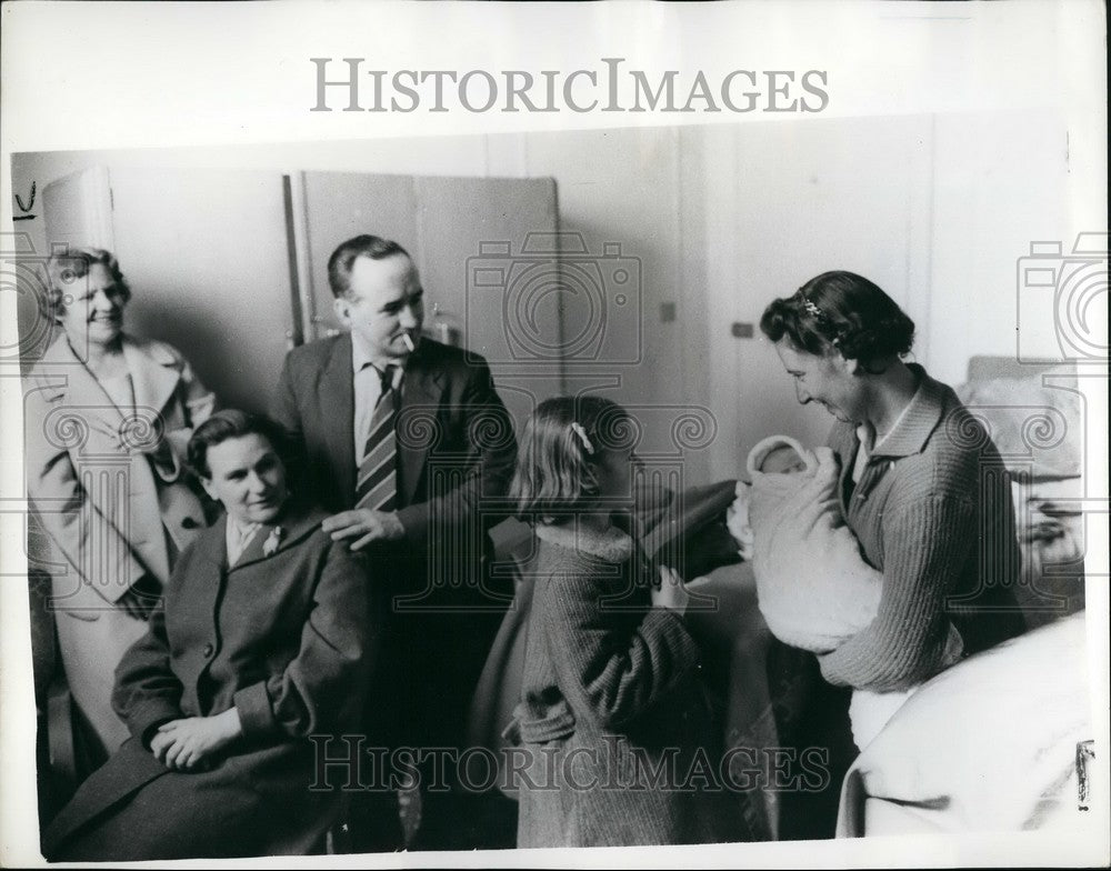 1960 Mrs. Yvonne Moore adopts 11 day old son to Mrs. Gladys Simon - Historic Images