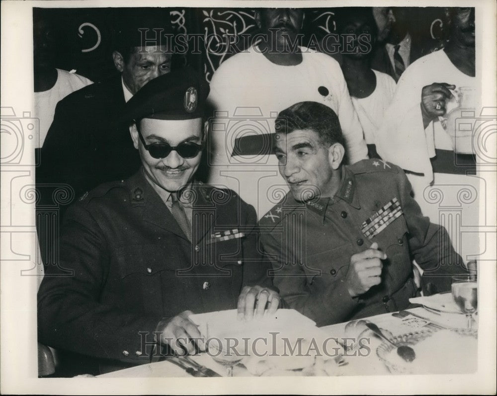 1954, President Mohammed Neguib chatting to Major Salah Salem - Historic Images