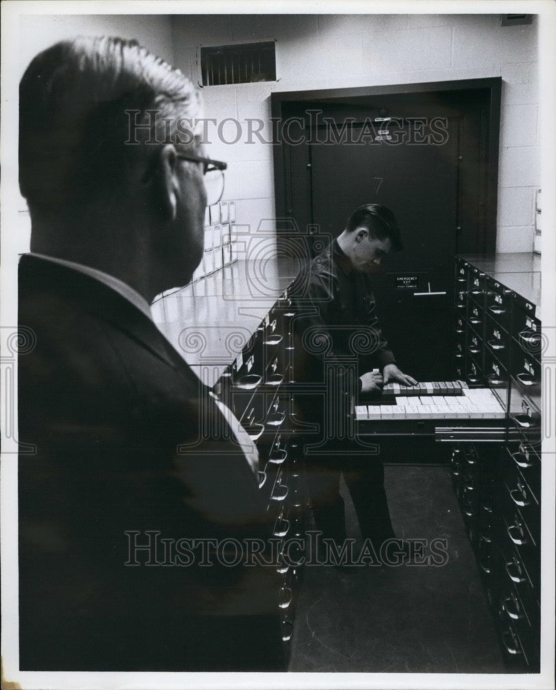 Press Photo Mr. Walker Supervising The Handling Of Clients' Microfilms - Historic Images