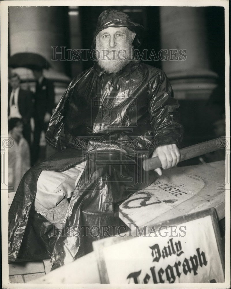 1961  bearded Stephen Glass of Tristan - at the helm of the Longboat - Historic Images