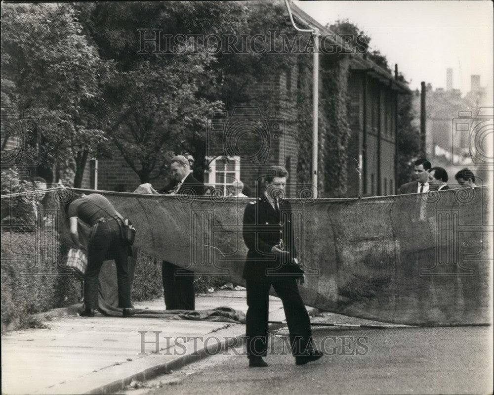 1966 Milkman Going Under Screen Erected By Police At Scene Of Murder - Historic Images