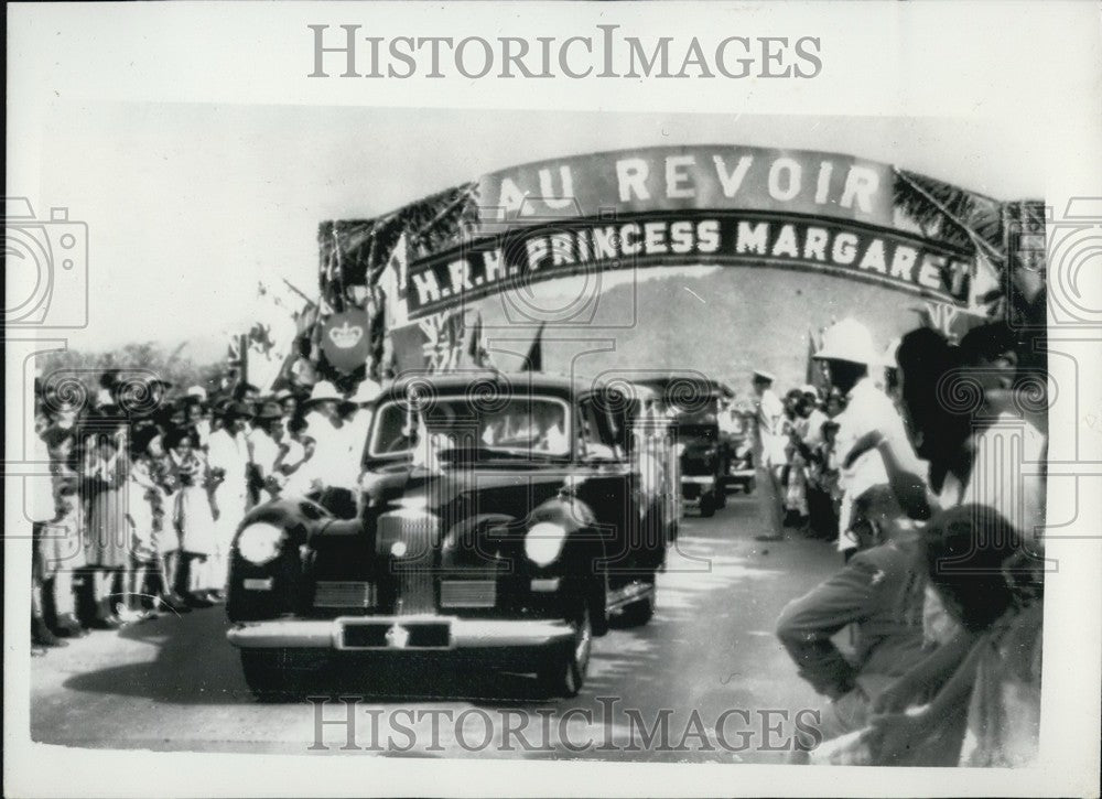 1955 Princess Margaret passes under Arch of Southern Highway - Historic Images