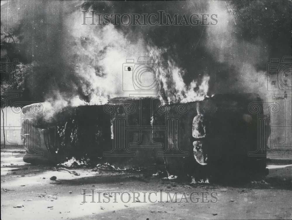 1958 Train Car on Fire During Libyan Protests - Historic Images