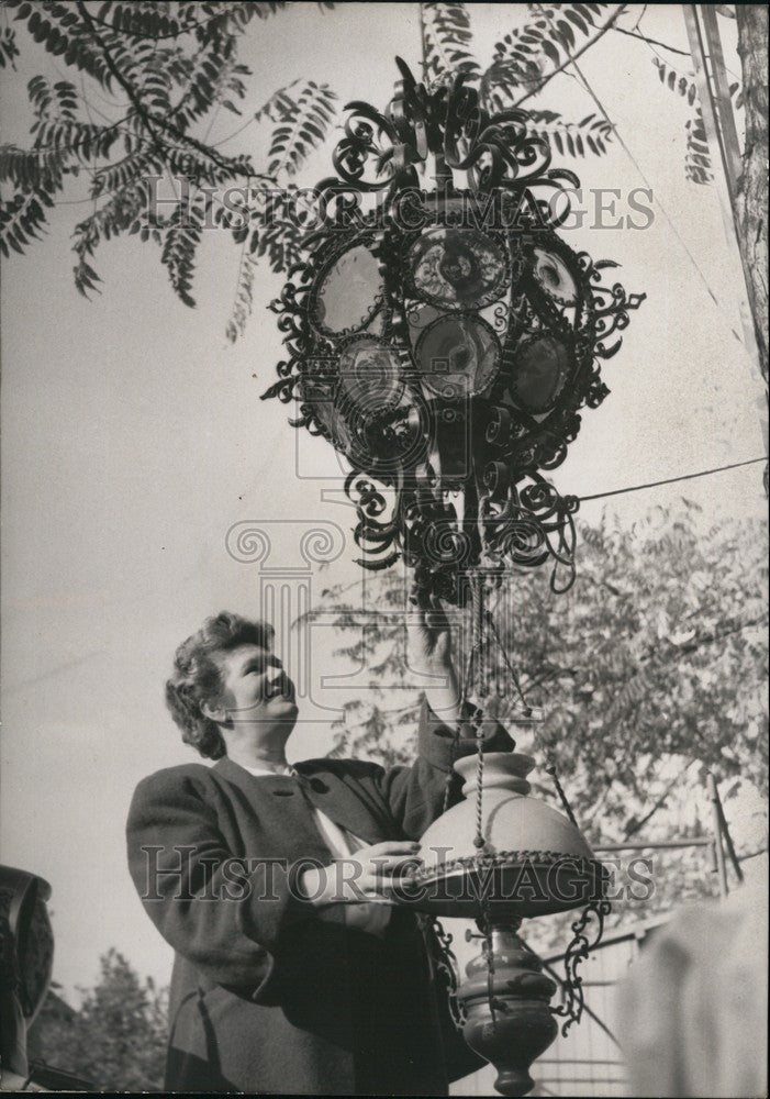 1953, Junk Fair Opens In Paris,an old chandelier in the Bric-A-Brac - Historic Images