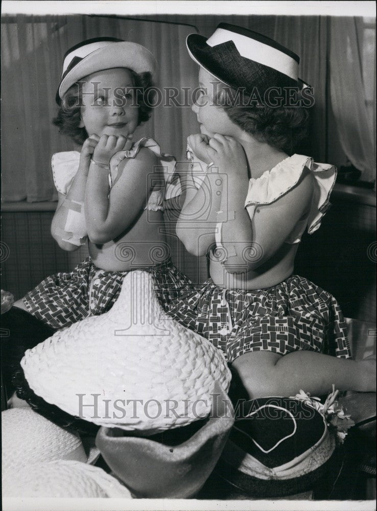Press Photo Susan Trying to Find the Right Hat - Historic Images
