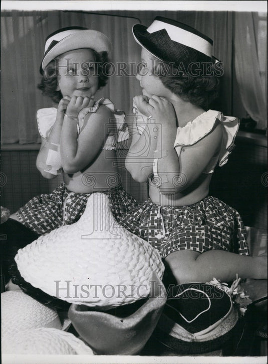 Press Photo Susan Trying to Find the Right Hat - Historic Images