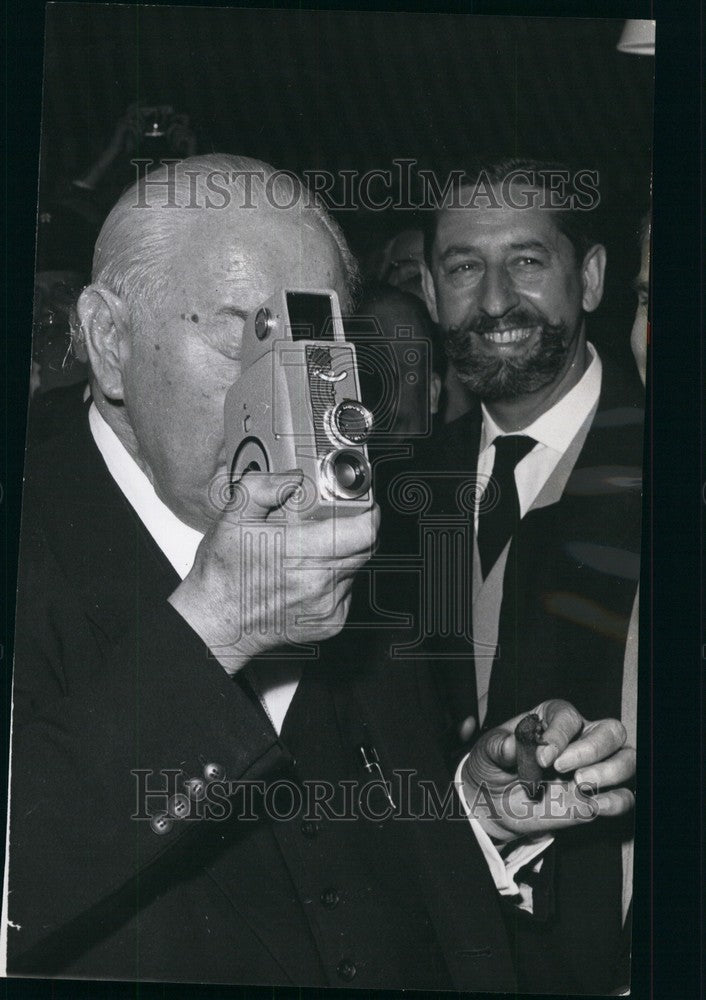 Press Photo Man Holding Camera - KSB72419 - Historic Images