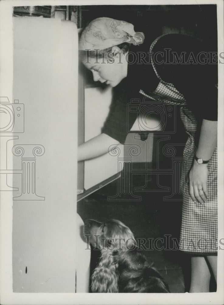 1954 Claire Rubattel, daughter of Swiss President works as a servant-Historic Images