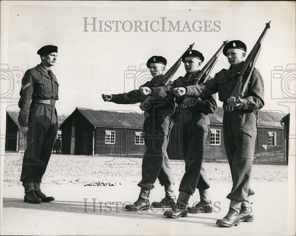 1953, Triplets Dennis; Allan and Brian Kirby National service - Historic Images