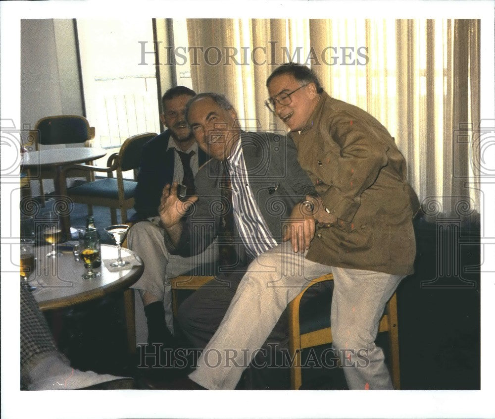 Press Photo Three men laughing - Historic Images