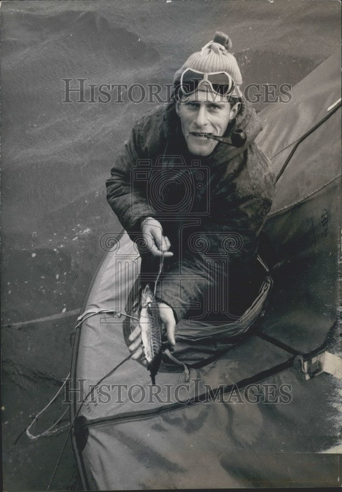 1955 Press Photo Brest Harbor Castaway Fisherman shows off Mackerel - Historic Images