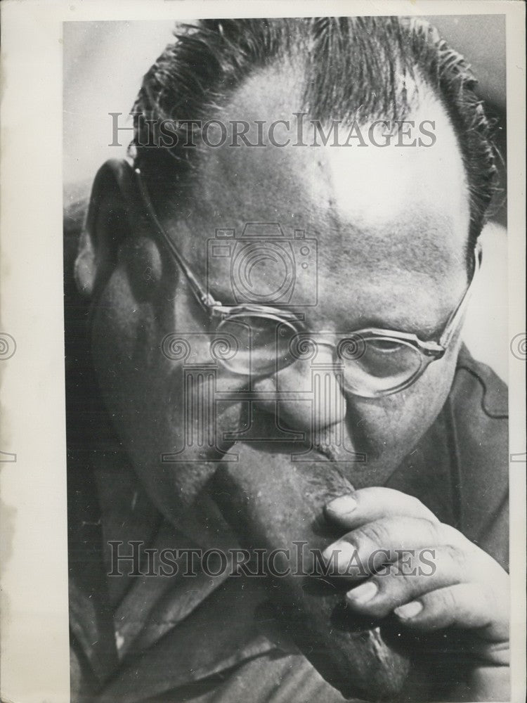 1952, Man eating cucumber + poem. - KSK02655 - Historic Images