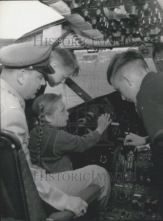 1954 American pilot showing "Flying Boxcar" to German public. - Historic Images