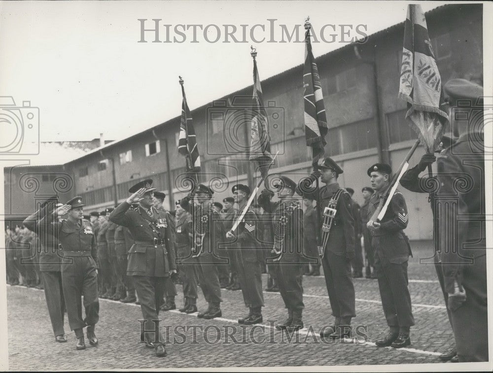 1952 General Coleman greets British troops in Berlin. - Historic Images